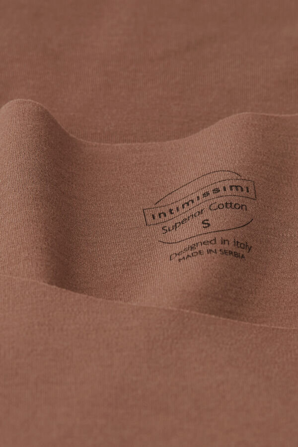 Canotta in cotone con scollo rotondo e bordi grezzi Canotta in cotone con scollo rotondo e bordi grezzi