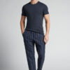 Pantaloni lunghi in cotone blu a righe bianche