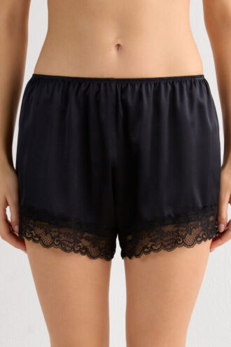 Shorts in seta con bordi in pizzo