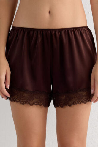 Shorts in seta con bordi in pizzo