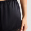 Shorts in seta con bordi in pizzo