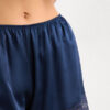 Shorts in seta con bordi in pizzo