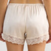 Shorts in seta con bordi in pizzo