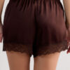 Shorts in seta con bordi in pizzo