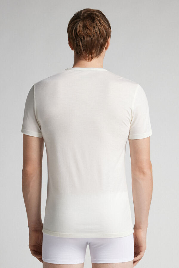 T-shirt a maniche corte in lana merino elasticizzata T-shirt a maniche corte in lana merino elasticizzata