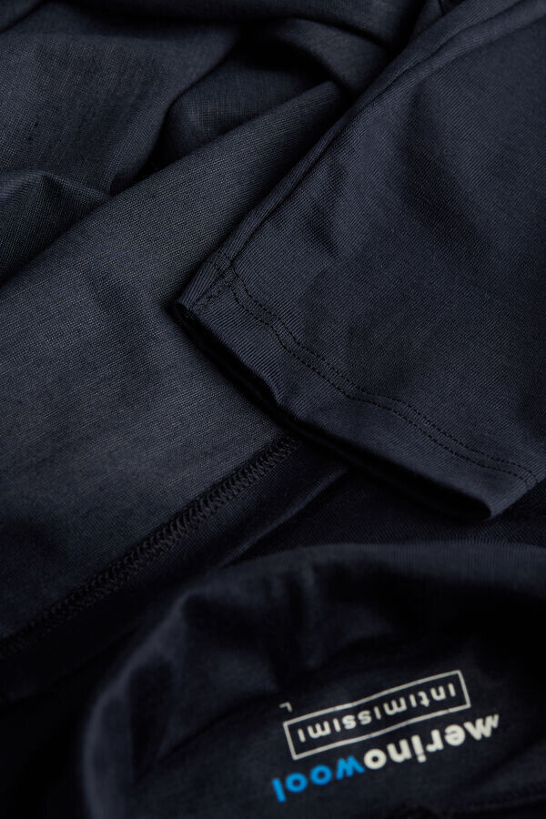 Top a maniche lunghe e collo alto in lana merino Top a maniche lunghe e collo alto in lana merino